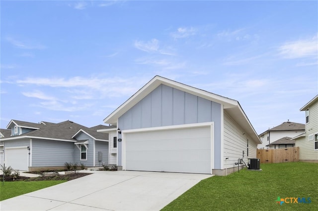 view of front of property with central air condition unit and a front lawn