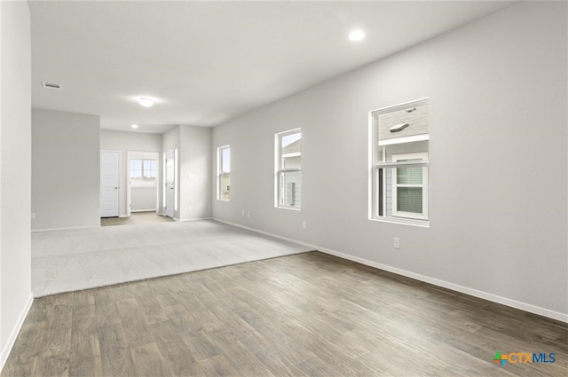 unfurnished room featuring wood-type flooring