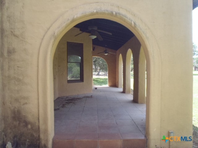 exterior space featuring a patio and ceiling fan