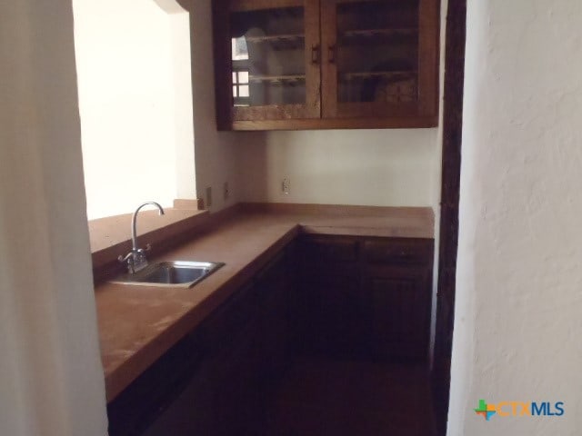 kitchen featuring a healthy amount of sunlight and sink