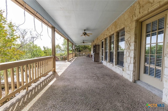 view of patio with a ceiling fan and covered porch