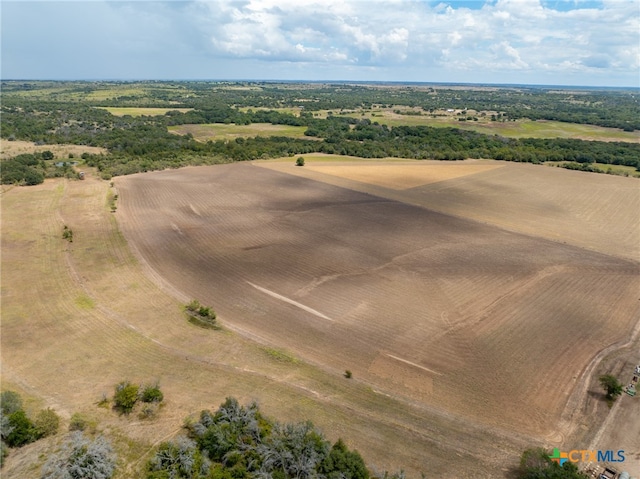 birds eye view of property featuring a rural view