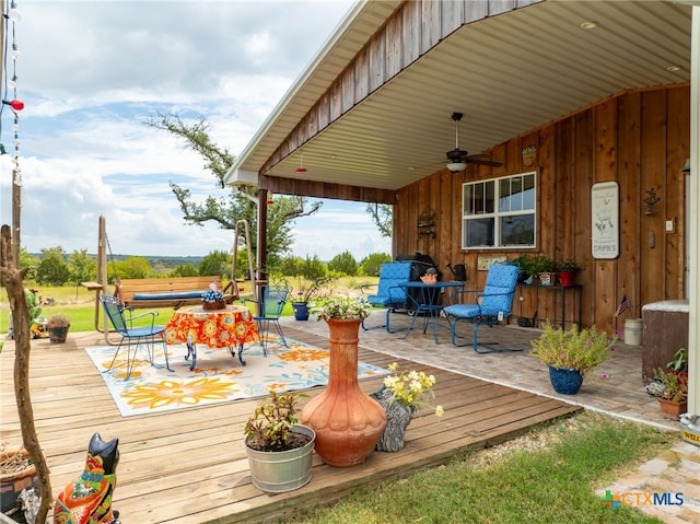 wooden deck with ceiling fan