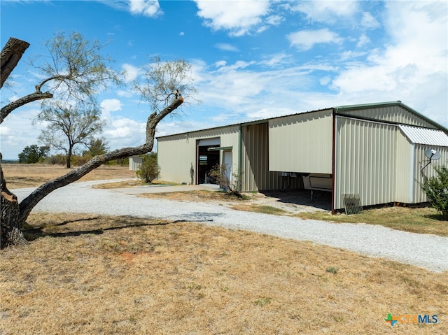 view of outbuilding featuring a garage