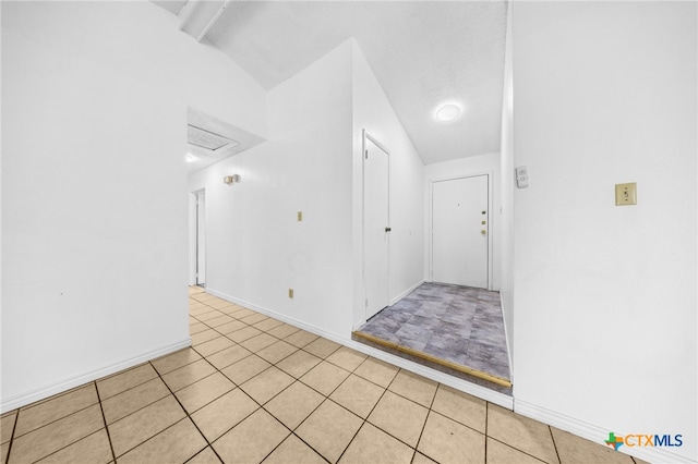 2310 Bunker Hill Dr, Temple, TX 76504 - hallway with baseboards and light tile patterned floors