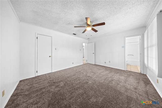 2310 Bunker Hill Dr, Temple, TX 76504 - unfurnished bedroom featuring carpet flooring, a textured ceiling, a ceiling fan, and ensuite bathroom