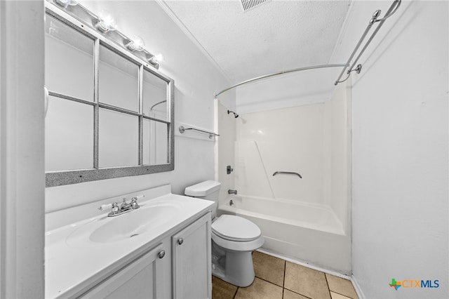 2310 Bunker Hill Dr, Temple, TX 76504 - full bath featuring vanity, shower / bath combination, tile patterned flooring, and a textured ceiling