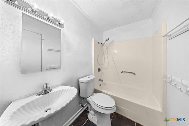 2310 Bunker Hill Dr, Temple, TX 76504 - full bathroom featuring a textured ceiling, washtub / shower combination, and a textured wall