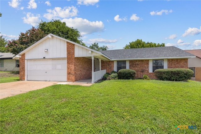 2310 Bunker Hill Dr, Temple, TX 76504 - ranch-style home featuring an attached garage, driveway, brick siding, and a front yard