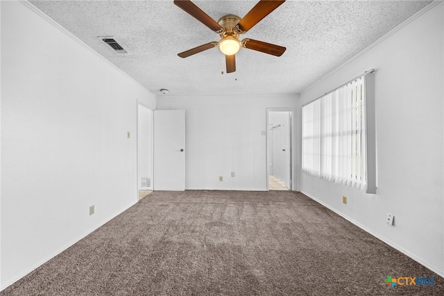 2310 Bunker Hill Dr, Temple, TX 76504 - spare room featuring carpet flooring, a textured ceiling, ceiling fan, and crown molding