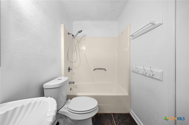 2310 Bunker Hill Dr, Temple, TX 76504 - full bathroom with a textured ceiling and bathing tub / shower combination