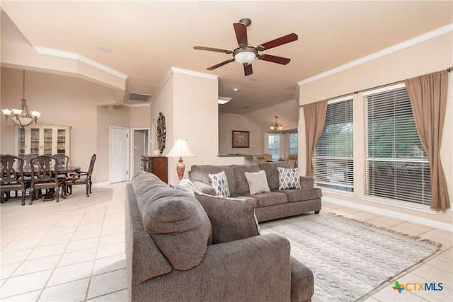 living room featuring light tile patterned floors, visible vents, baseboards, ornamental molding, and ceiling fan with notable chandelier