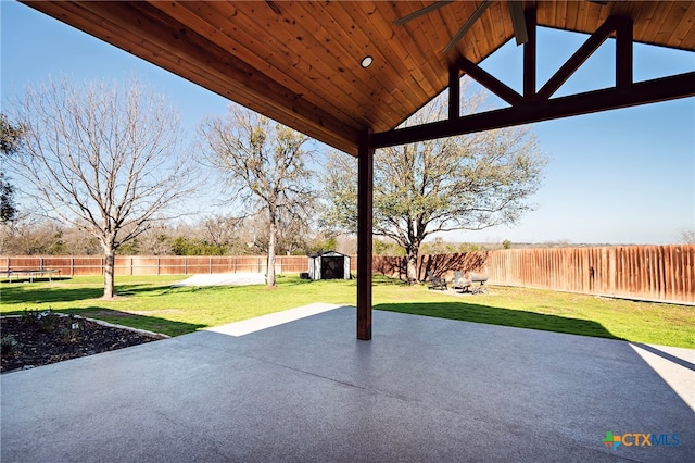 view of patio / terrace with a storage shed