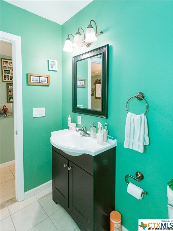 bathroom with vanity and tile patterned floors