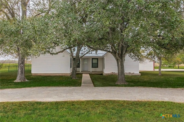 view of front of home with a front yard