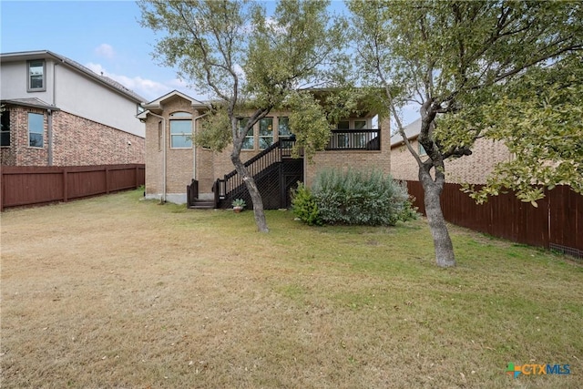 8113 Cannon Ct, Lago Vista, TX 78645 - fenced backyard featuring stairway