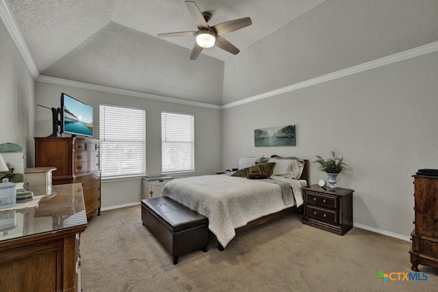 carpeted bedroom with lofted ceiling, crown molding, a textured ceiling, a tray ceiling, and ceiling fan