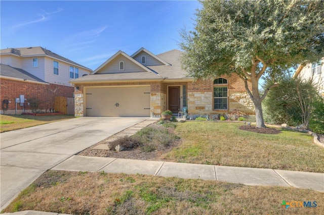 view of front of house with a garage and a front yard