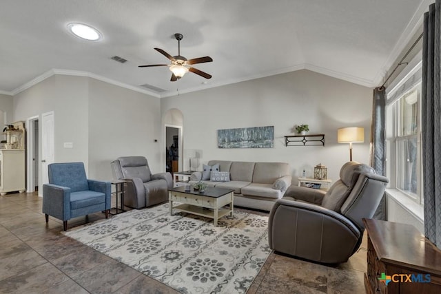 living room with ceiling fan, crown molding, vaulted ceiling, and a healthy amount of sunlight