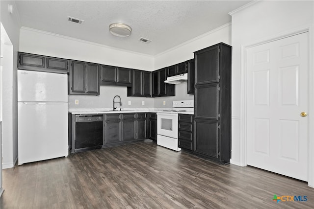 kitchen with a textured ceiling, white appliances, crown molding, dark wood-type flooring, and sink