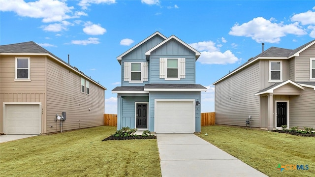 view of front facade with a garage and a front lawn