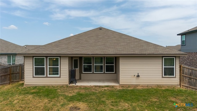 6505 Cassidy Ln, Killeen, TX 76542 - back of property with a patio area and roof with shingles