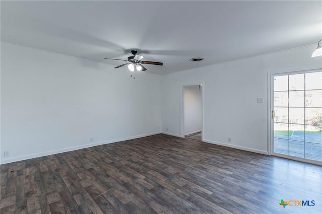 empty room with dark hardwood / wood-style floors and ceiling fan