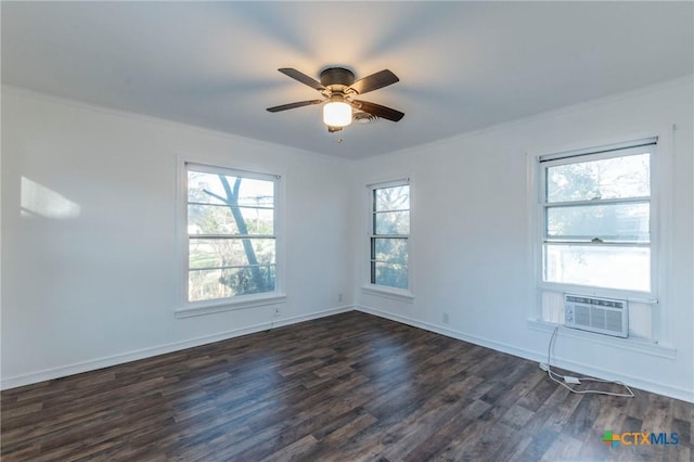 empty room with ceiling fan, cooling unit, dark hardwood / wood-style floors, and ornamental molding