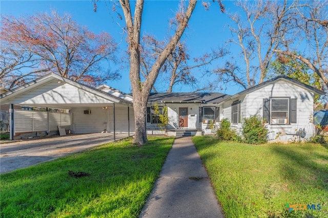 single story home with a carport and a front yard