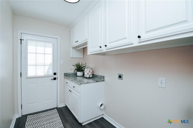 194 Panorama Ln, Victoria, TX 77905 - washroom featuring hookup for an electric dryer, dark wood-style flooring, baseboards, and cabinet space