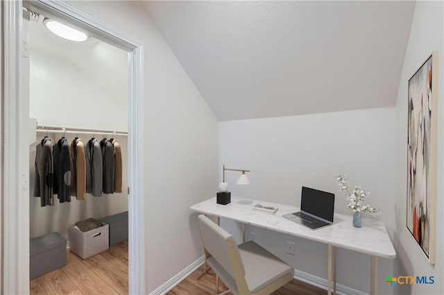 2033 Northview Dr, San Marcos, TX 78666 - office area with lofted ceiling and wood finished floors