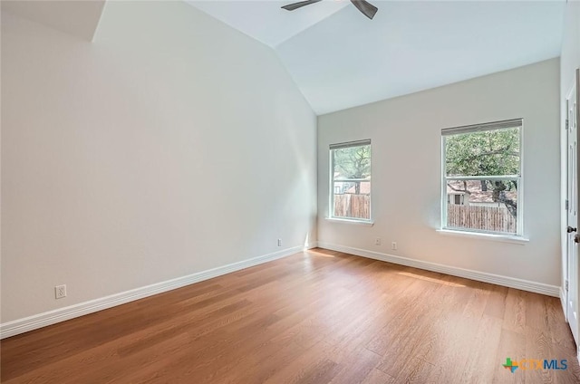 2033 Northview Dr, San Marcos, TX 78666 - spare room featuring light wood finished floors, lofted ceiling, and a ceiling fan