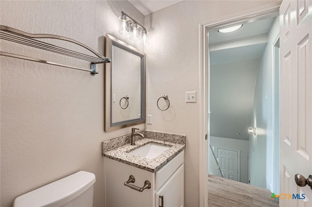 2033 Northview Dr, San Marcos, TX 78666 - bathroom with vanity and a textured wall