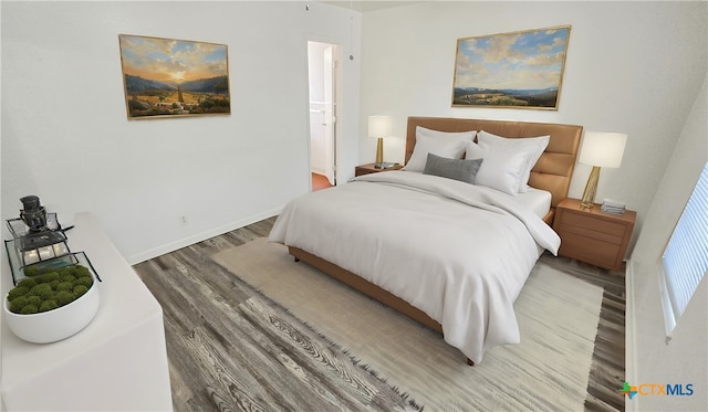 bedroom featuring wood-type flooring