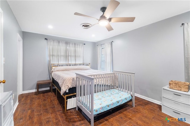 204 W Johnson St, Cuero, TX 77954 - bedroom with wood finished floors, ceiling fan, and recessed lighting
