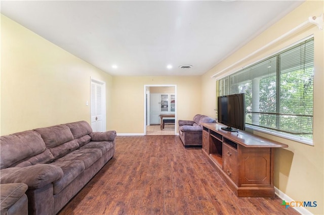 204 W Johnson St, Cuero, TX 77954 - living area with wood finished floors and recessed lighting