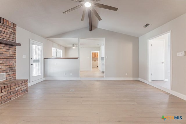 unfurnished living room featuring vaulted ceiling with beams, visible vents, ceiling fan, light wood-type flooring, and baseboards