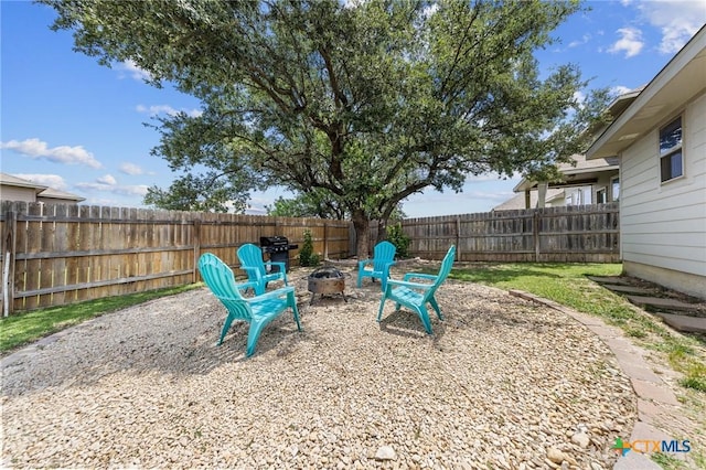 1442 Neff Dr, Copperas Cove, TX 76522 - fenced backyard featuring an outdoor fire pit
