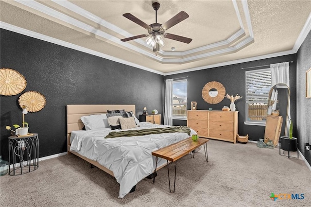 1442 Neff Dr, Copperas Cove, TX 76522 - carpeted bedroom featuring crown molding, a tray ceiling, a textured wall, a textured ceiling, and ceiling fan
