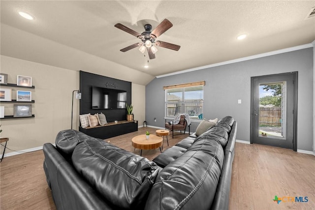 1442 Neff Dr, Copperas Cove, TX 76522 - living room with a ceiling fan, wood finished floors, ornamental molding, recessed lighting, and vaulted ceiling