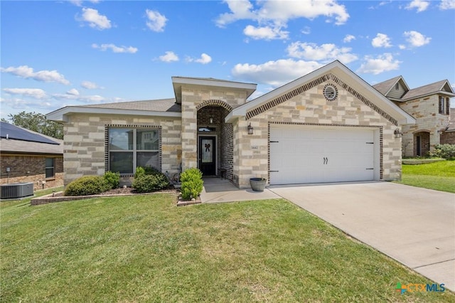 1442 Neff Dr, Copperas Cove, TX 76522 - view of front of house with a garage, stone siding, concrete driveway, and a front yard