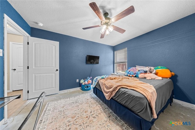 1442 Neff Dr, Copperas Cove, TX 76522 - bedroom featuring a textured ceiling and ceiling fan