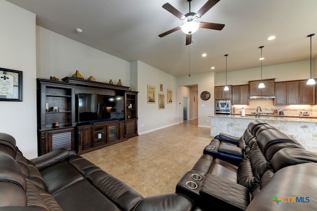 living room with ceiling fan