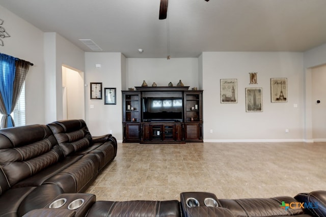 living room featuring light colored carpet and ceiling fan