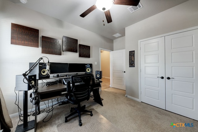 office area featuring light colored carpet and ceiling fan