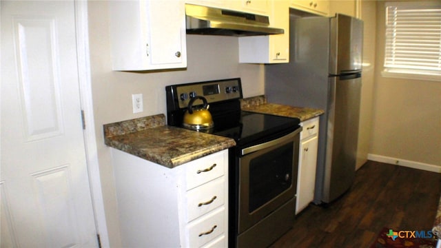 kitchen featuring white cabinets, stainless steel electric stove, dark stone countertops, and dark wood-type flooring