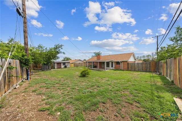 101 E Hogan Dr, Copperas Cove, TX 76522 - fenced backyard with an outbuilding