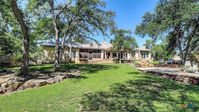 680 Saddleridge Dr, Wimberley, TX 78676 - view of yard with a patio, fence, and a sunroom