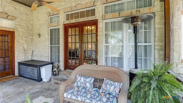680 Saddleridge Dr, Wimberley, TX 78676 - view of patio / terrace with a ceiling fan and french doors