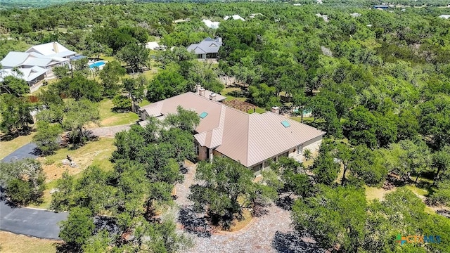 680 Saddleridge Dr, Wimberley, TX 78676 - drone / aerial view with a wooded view